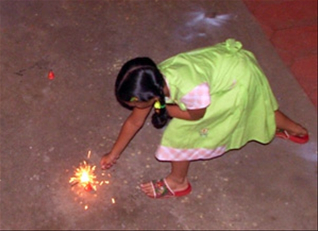 Flower Pot being lighted during Deepavali 2006